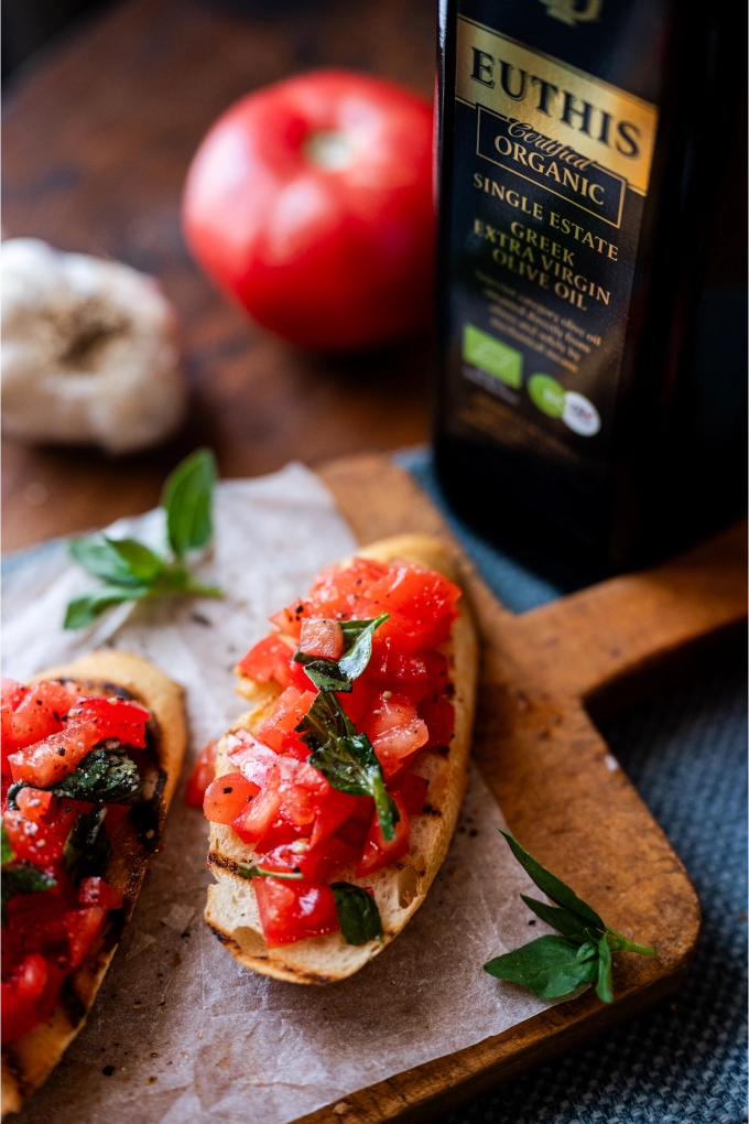Bruschetta Romana with tomatoes, basil and Euthis Greek Extra Virgin Olive Oil