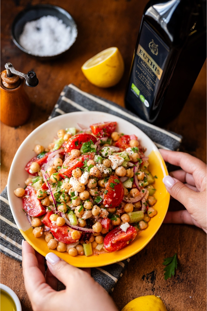 Mediterranean chickpea salad with tomatoes, cucumber, feta and Euthis Organic Extra Virgin Olive Oil